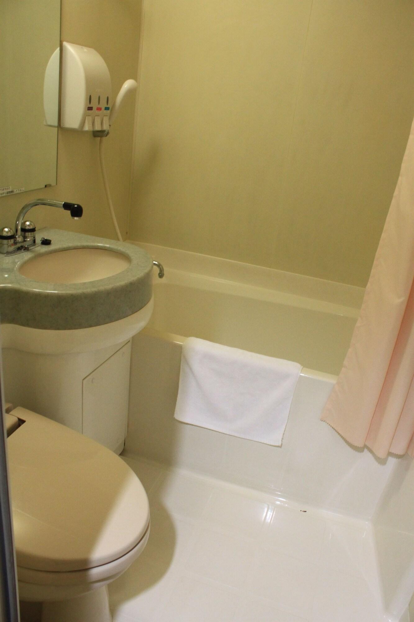 Hotel Ascent Inn Sapporo Bagian luar foto