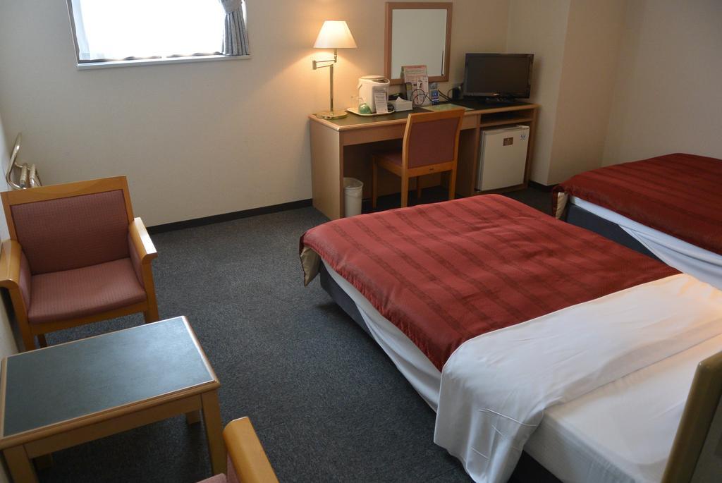 Hotel Ascent Inn Sapporo Bagian luar foto