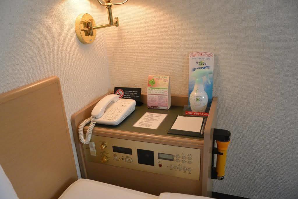 Hotel Ascent Inn Sapporo Bagian luar foto